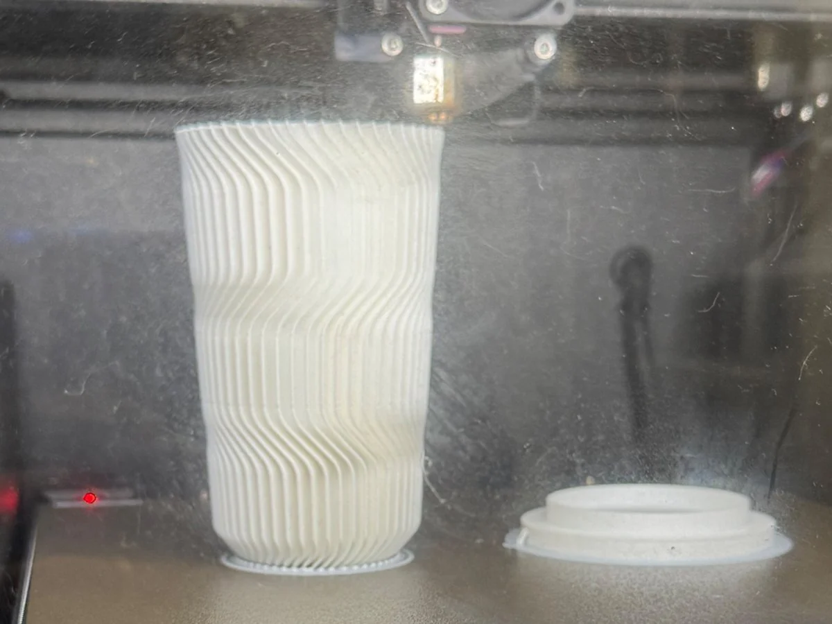 The FOCUS lamp shade and base printing in white on a Prusa 3D printer